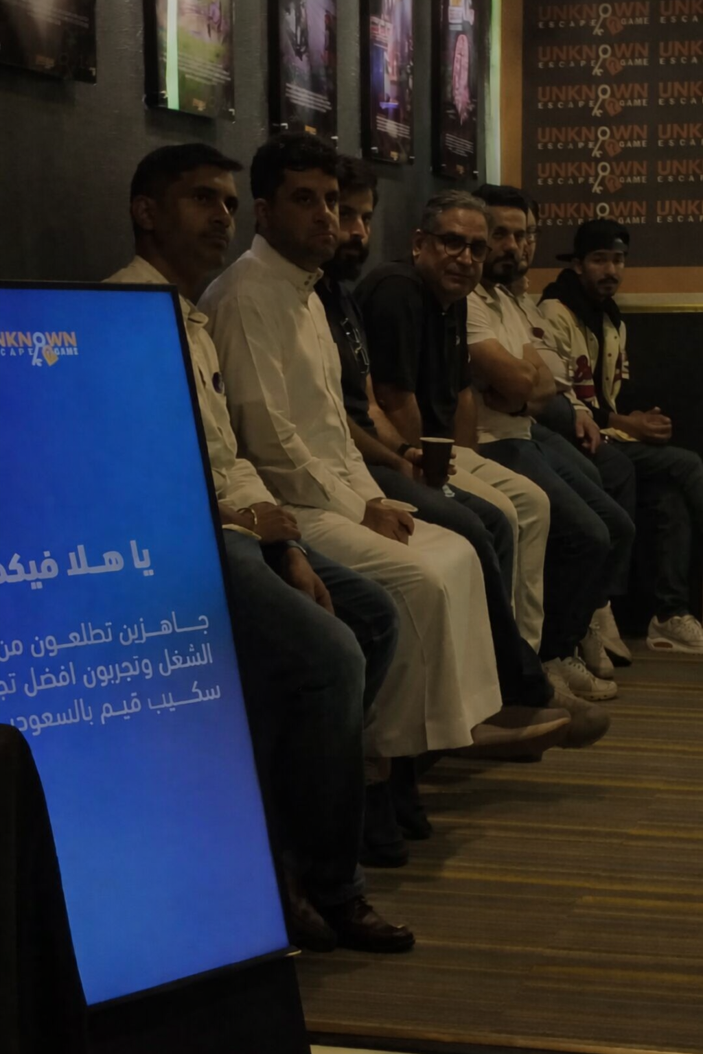 Team discussing strategy to solve a puzzle